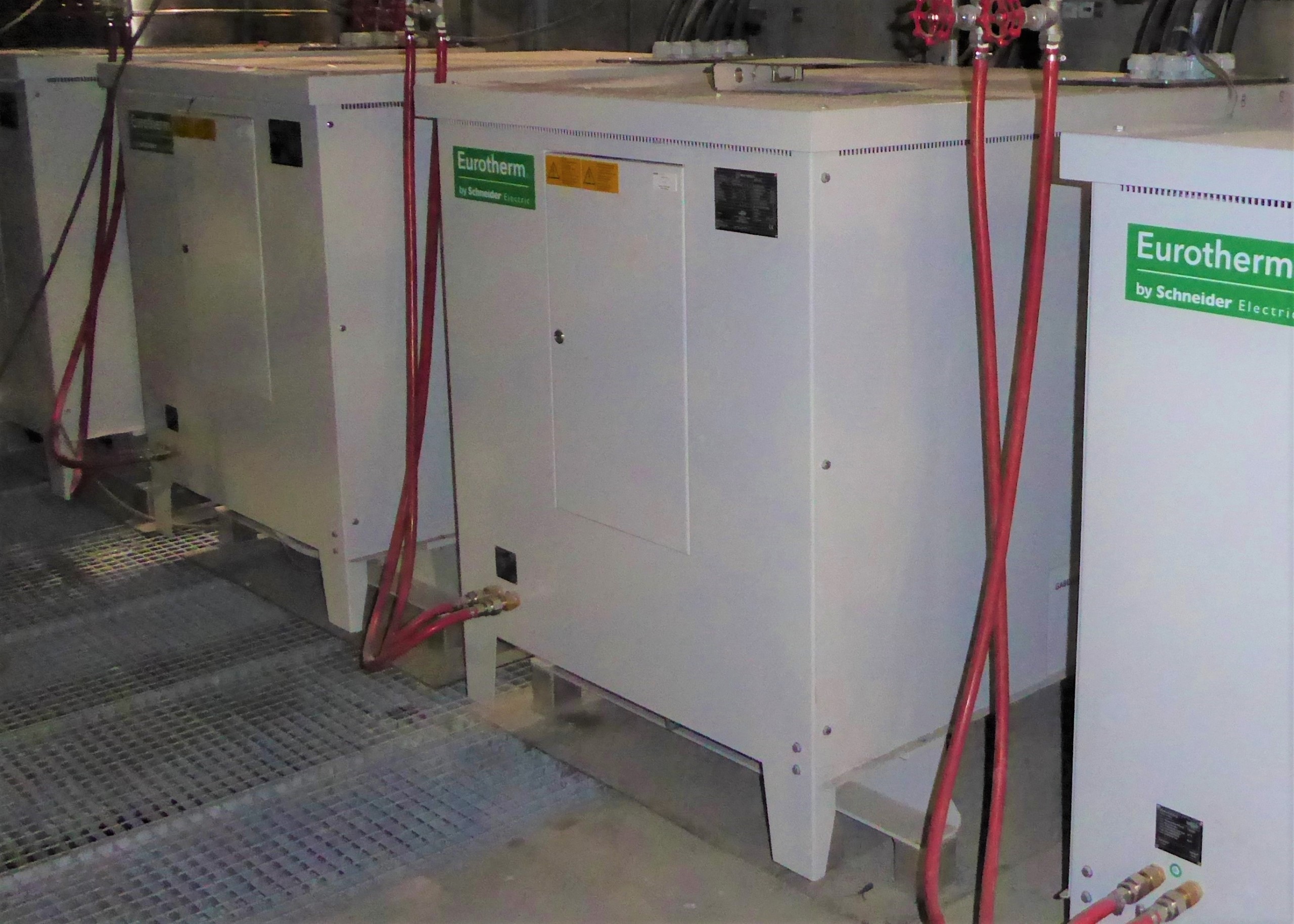 A network of Eurotherm water-cooled power supply boxes offers redundant power capability.